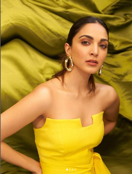Actress Kiara Advani looks sexy in a yellow thigh-high slit gown, See Pics