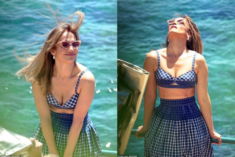 Newlywed Jennifer Lopez looks incredible in a blue checked bra top and full skirt on a glamorous photoshoot in Capri