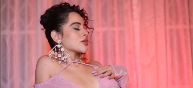 Urfi Javed covers modesty with a baby pink sheer crop top, See Pics