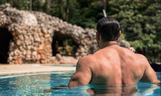 Salman Khan flaunts his back muscles and triceps as he drops his shirtless picture taking a dip in the pool