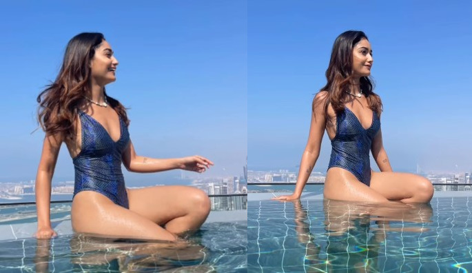 Tridha Choudhury drops a video enjoying her pool time wearing a blue swimsuit